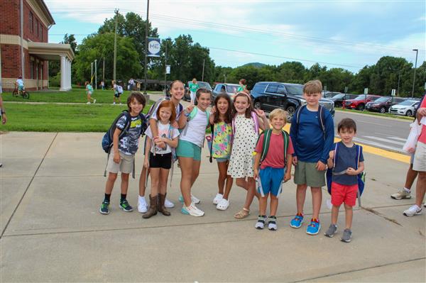 Students walking in on the first day of school. 